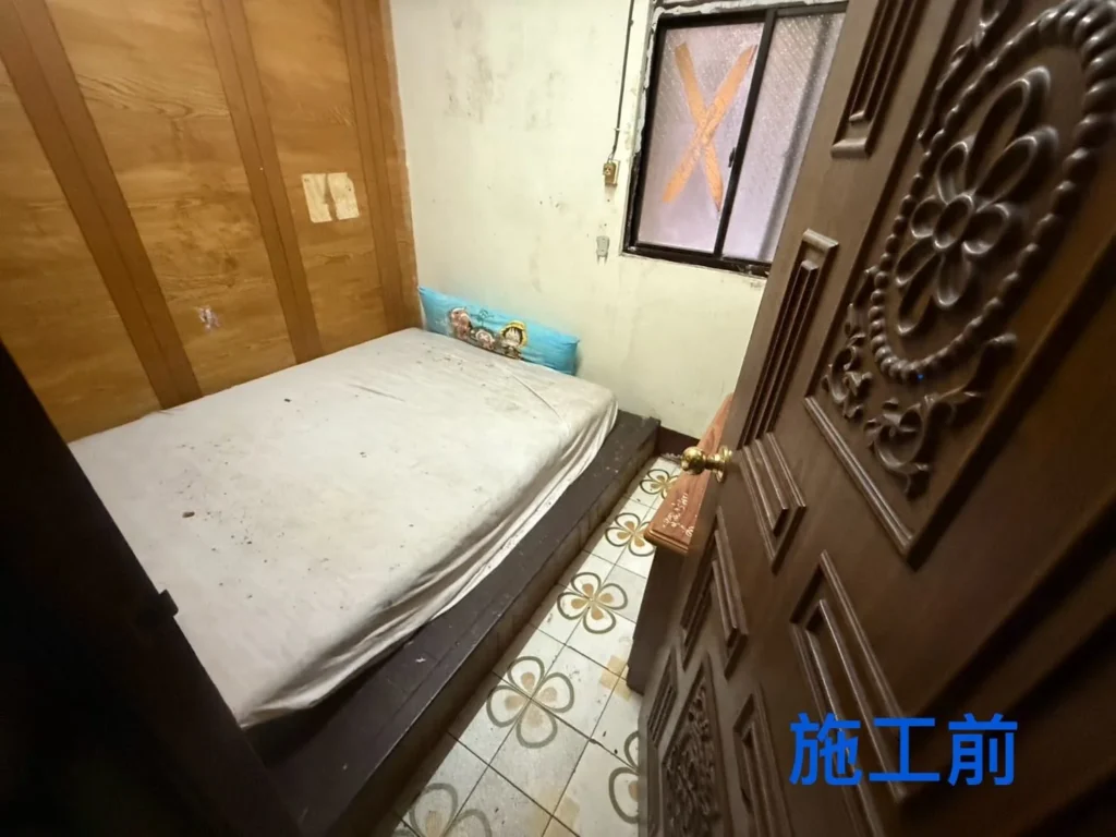 仁二路167巷住宅清運前房間留有床架與床墊